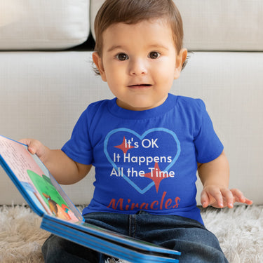 Bella+Canvas baby t-shirt with “Miracles Happen” design and uplifting message, soft cotton, breathable and durable, Christian apparel for infants and family matching, baby boy in blue shirt